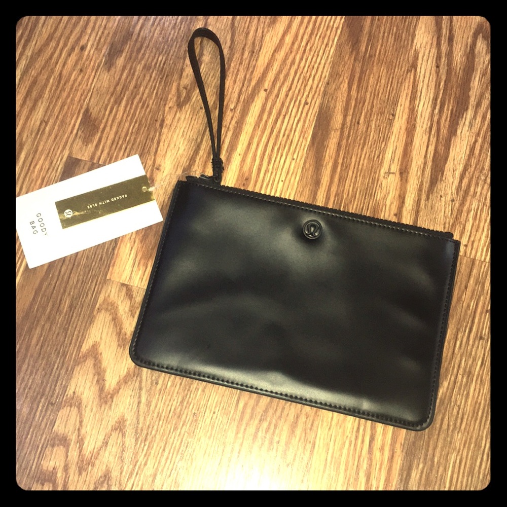 Lululemon brand new with tags black hand bag
